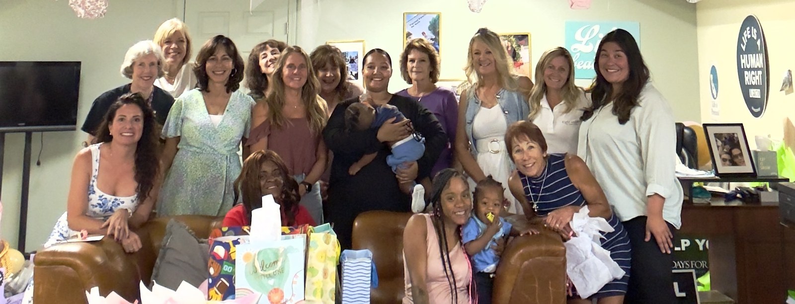 LIFEHOUSE volunteers and community members at a baby shower